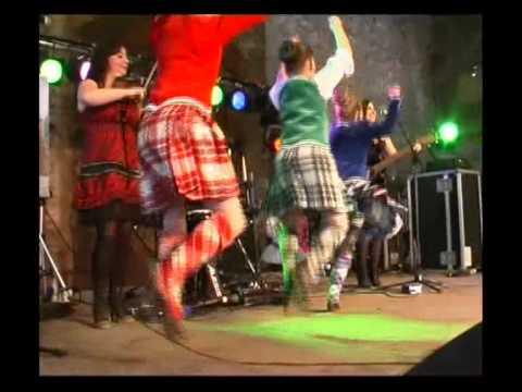 Performing The Athole Highlanders With Highland Dancers