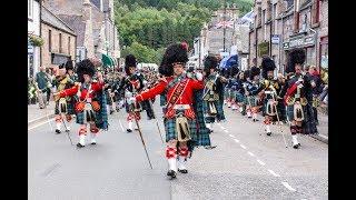 Massed Pipes & Drums -  parade through Deeside town to start the Ballater Highland Games 2018